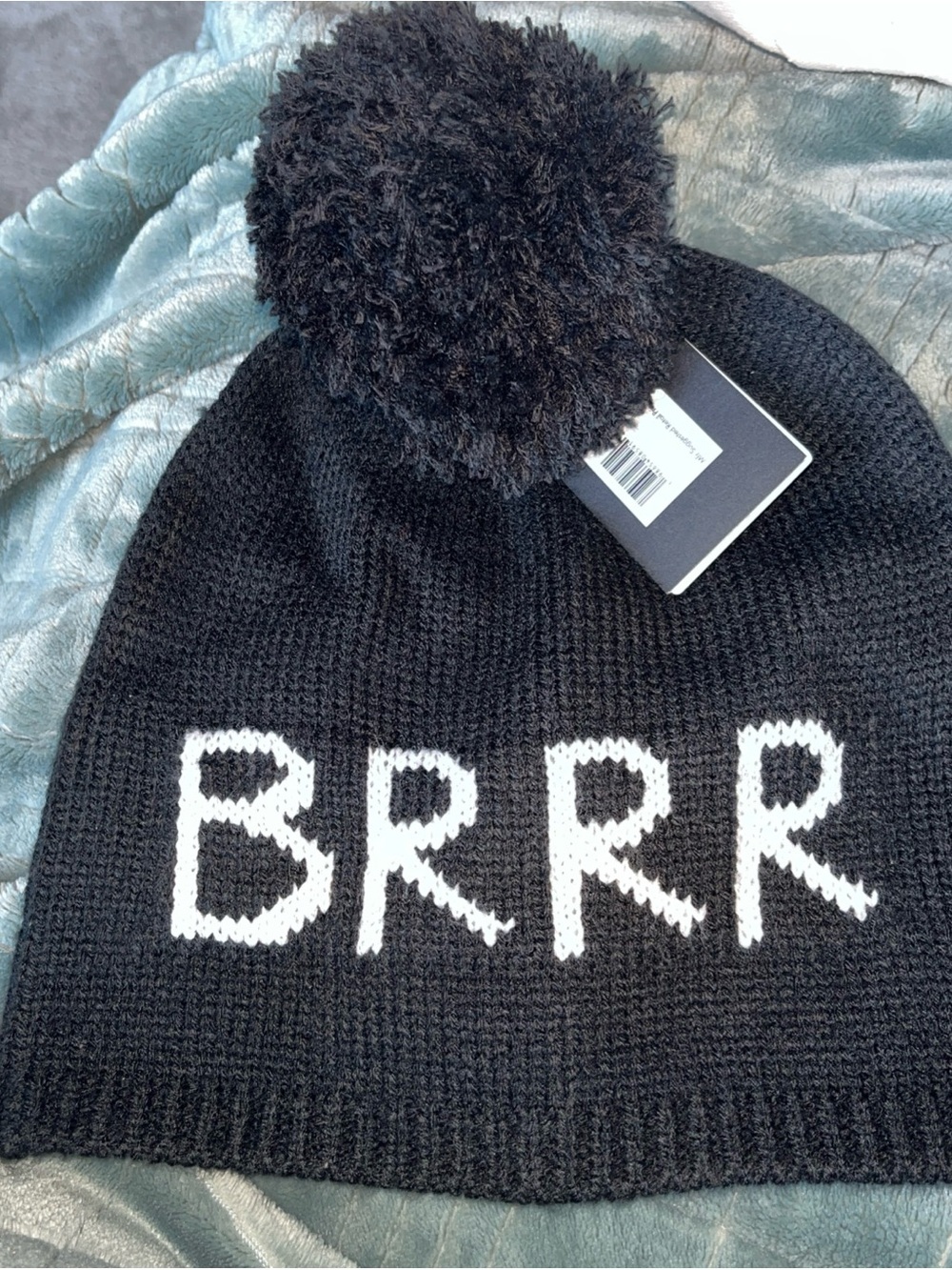 Kate Spade Black 'BRRR' Pom-Pom Beanie
Metallic thread text One Size